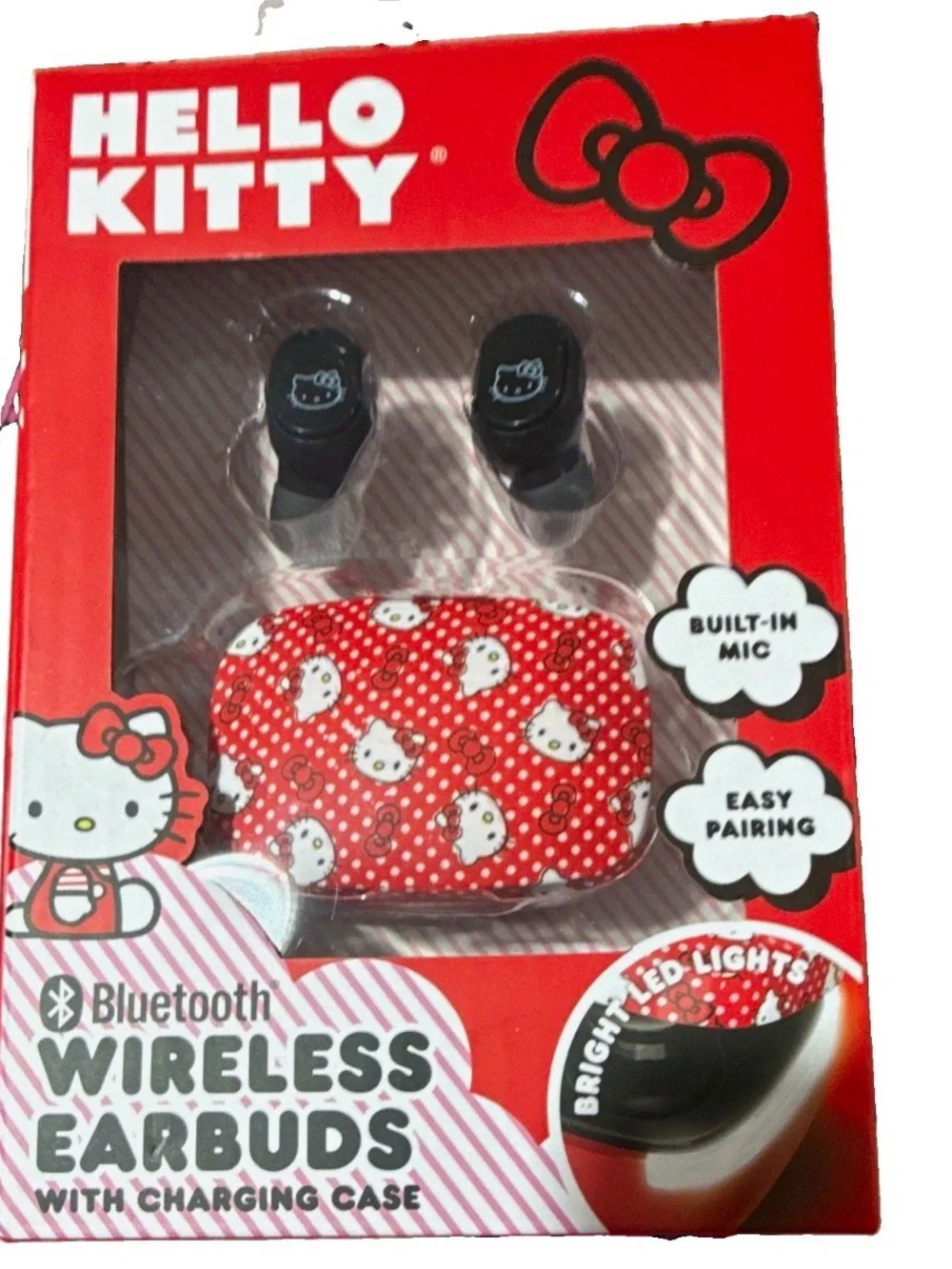 NIB Hello Kitty Black Earbuds with Red Patterned Charging Case